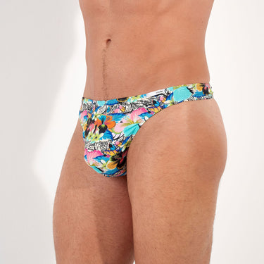 Colorful floral-patterned thong on a plain background